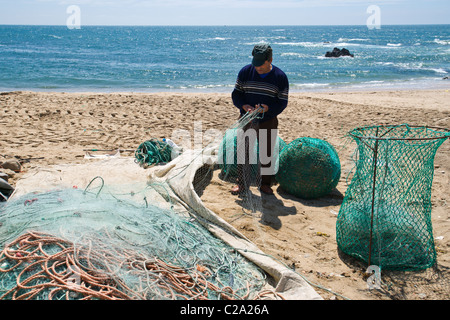 Filets d'pêcheur portugais sur la rive Banque D'Images