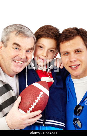 Une famille heureuse de trois hommes smiling at camera Banque D'Images