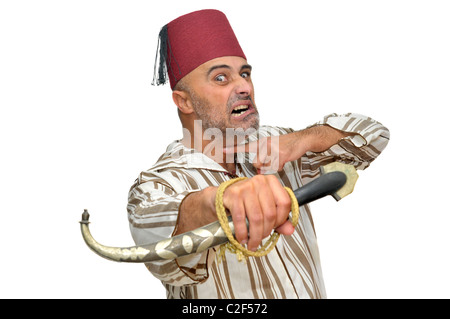 L'homme arabe avec un poignard making funny faces isolées dans White Banque D'Images