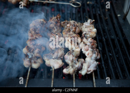 Stigghiola la cuisson par le côté de la route de Palerme Sicile Banque D'Images