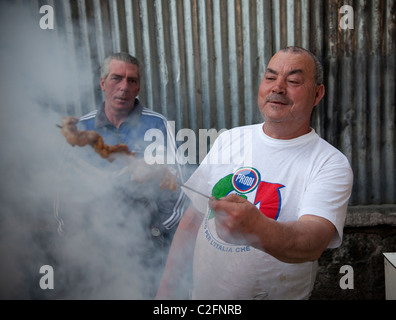 Stigghiola la cuisson par le côté de la route de Palerme Sicile Banque D'Images