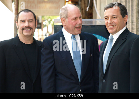 John Travolta,Michael D. Eisner, et Bob Iger Michael D. Eisner honoré du 2361St étoile sur le Hollywood Walk of Fame Los Banque D'Images