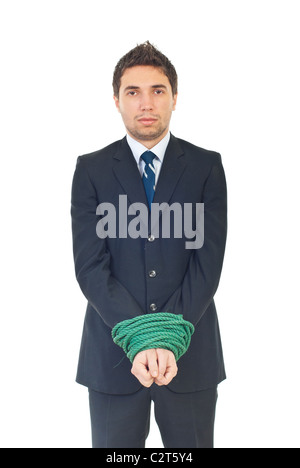 Triste homme exécutif ayant ses mains bien relié à la caméra à isolé sur fond blanc Banque D'Images