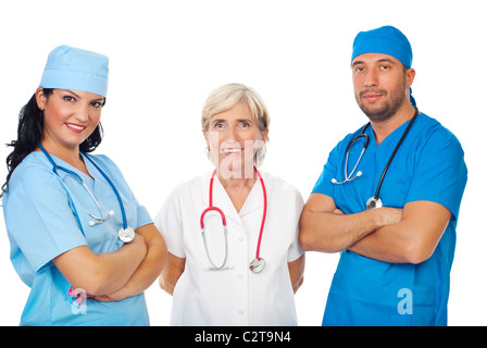 Professionnels Personnel de trois médecins différents standing traversé isolé sur fond blanc Banque D'Images