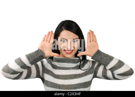 Happy woman with hands up près de visage isolé sur fond blanc Banque D'Images