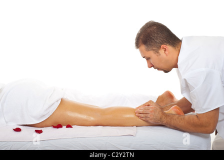Woman receiving massage pétrie de type sur sa jambe un masseur professionnel Banque D'Images