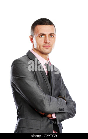 Portrait of a handsome young businessman in suit over white background Banque D'Images