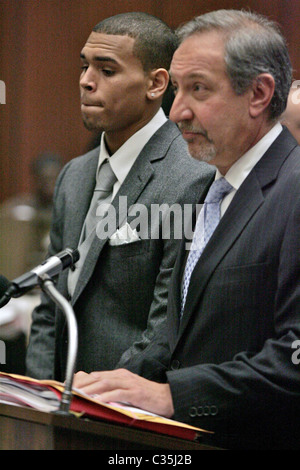 Los Angeles Superior Court Judge Larry Paul Fidler listens during a ...