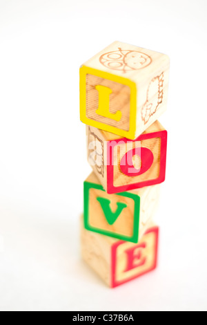 Alphabet Vintage blocks spelling out LOVE Banque D'Images