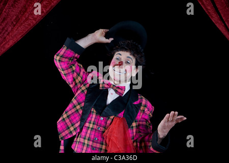 Clown de cirque Waving Arms Banque D'Images