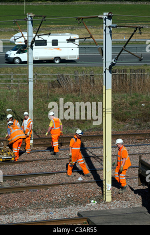 Babcock Rail Engineers répare les lignes de chemin de fer à Beattock Summit ; Safety & Construction, High Visibility Network Contractors en Écosse, Royaume-Uni Banque D'Images