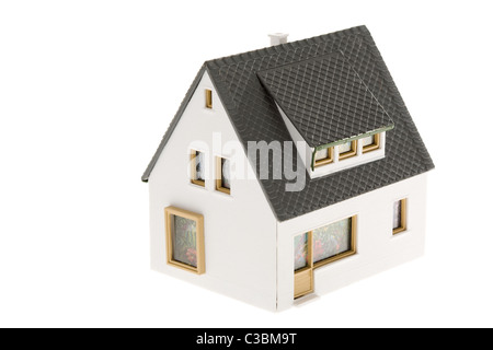 Close-up of toy house model on white background Banque D'Images