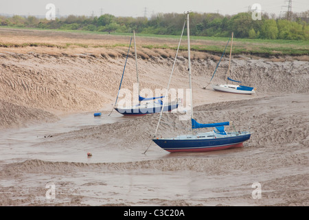 Trois bateaux sur les vasières à marée basse Portishead Bristol Banque D'Images