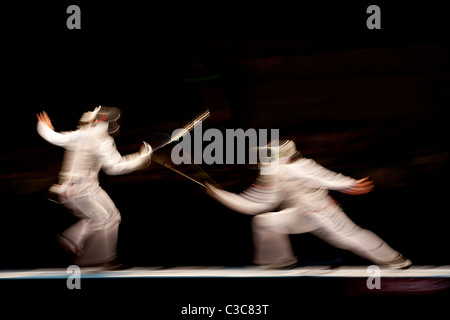 Action menée par des trouble d'escrime au Jeux Olympiques d'été 2008, Pékin, Chine Banque D'Images