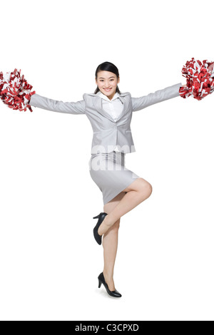 Une femme d'acclamations de pompons Banque D'Images