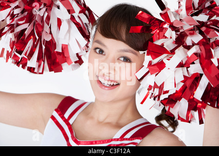 Portrait d'un cheerleader en rouge Banque D'Images