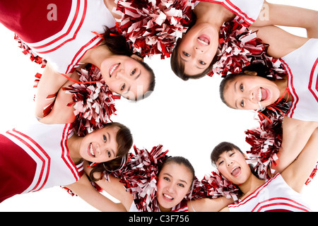 Un cheerleader huddle Banque D'Images