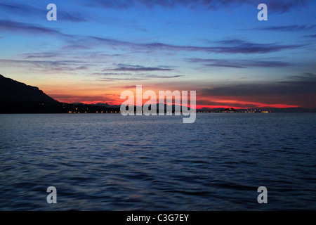 Denia coucher du soleil à partir de la mer Méditerranée backlight Alicante Espagne Banque D'Images