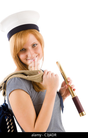 Jeune femme marin heureux avec spyglass dans sailor hat Banque D'Images