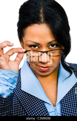 Woman wearing eyeglasses and smiling isolated over white Banque D'Images