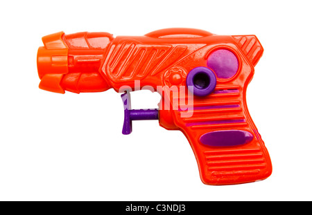 Pistolet en plastique orange isolated over white Banque D'Images