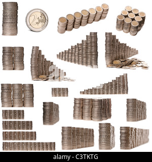 Des piles de 2 Euros in front of white background Banque D'Images