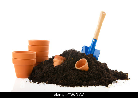 Pots de fleurs du sable et des outils de travail pour travailler dans le jardin Banque D'Images