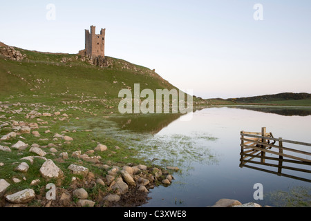 Lilburn tour fait partie du château de Dunstanburgh sur la côte de Northumberland Banque D'Images