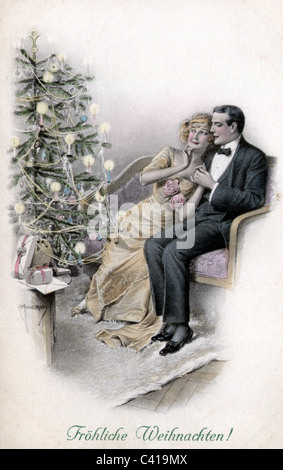 Noël, cadeau, jeune couple avec arbre de Noël, illustration, vers 1900, carte de voeux, « Joyeux Noël ! », droits supplémentaires-Clearences-non disponible Banque D'Images