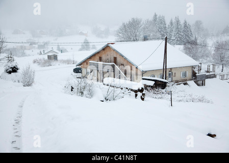 Village couvert de neige Banque D'Images