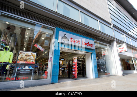 La devanture de la high street détaillant Foot Locker sur Market Street, Manchester. (Usage éditorial uniquement). Banque D'Images