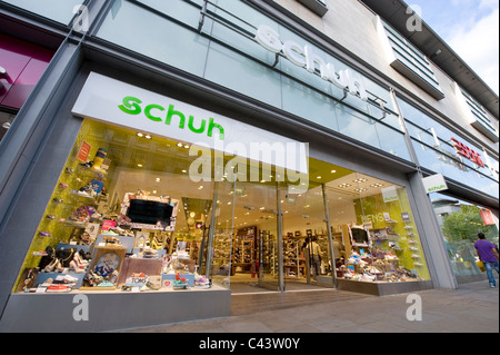 La devanture de la high street détaillant Schuh sur Market Street, Manchester. (Usage éditorial uniquement). Banque D'Images