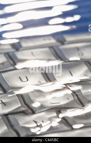 Détail d'un clavier d'ordinateur sous l'eau Banque D'Images