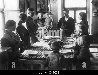 Famille disant grace, 1936 Banque D'Images