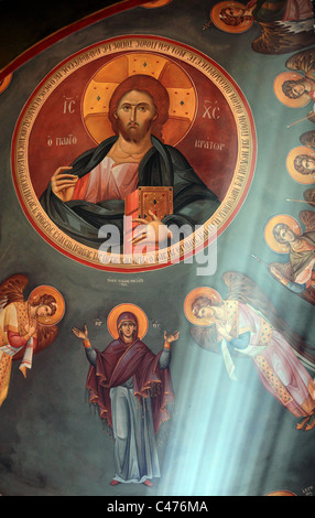 Peinture orthodoxe avec des rayons de lumière dans une église à Kefalos Kos Grèce Banque D'Images