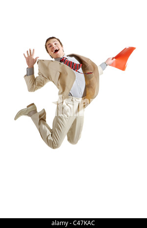 Portrait of cheerful businessman jumping avec dossier dans les mains Banque D'Images
