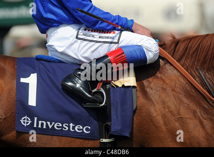 Gros plan d'une des bottes et jockeys Saddlecloth Banque D'Images