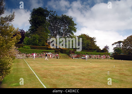 Une partie de croquet sur la pelouse de croquet à Kingston Maurward College, Dorchester, Dorset, England, UK Banque D'Images