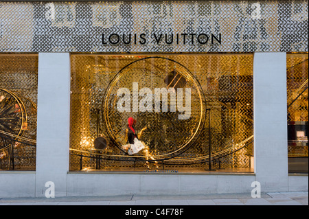 Louis Vuitton luxury store interior and people shopping shoppers inside on  New Bond Street in London England UK Great Britain KATHY DEWITT Stock Photo  - Alamy