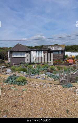 Maisons sur la plage à Pevensey Bay East Sussex, Angleterre Banque D'Images