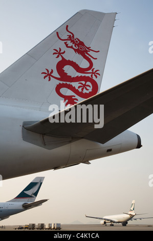 Avion Dragonair livery tailfin logo de queue Banque D'Images