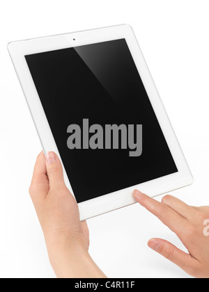 Young woman holding Apple iPad 2 tablette dans ses mains. Isolé sur fond blanc. Banque D'Images