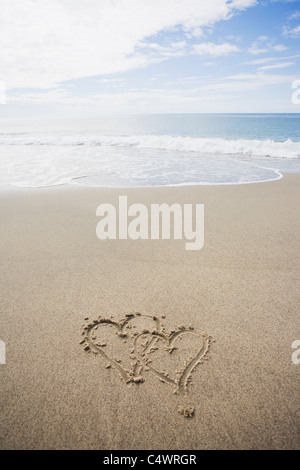 USA, Massachusetts, le coeur dessiné sur une plage de sable Banque D'Images