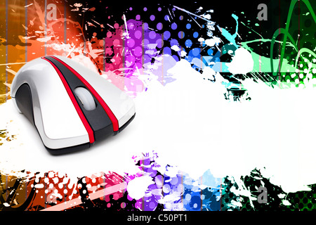 Une couleur arc-en-ciel et funky splatter mise en page avec une souris d'ordinateur et beaucoup d'espace de copie. Banque D'Images