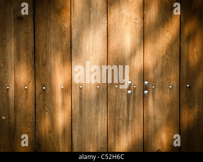 Magic jeux de lumieres sur mur en bois ou la texture d'arrière-plan Banque D'Images