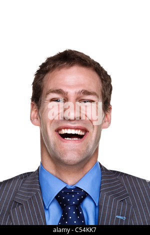 Photo d'un homme avec un rire expression sur son visage, portrait isolé sur un fond blanc. Partie d'une série. Banque D'Images