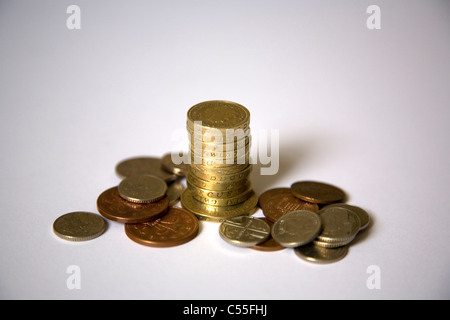 Pile de pièces Livre et changer Banque D'Images