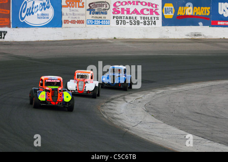 Denver, CO - Chris Eggleston tours tourner quatre légendes dans sa voiture de course à la Colorado National Speedway Banque D'Images