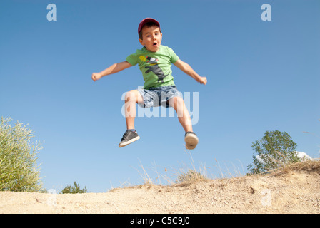 Gagner,happy boy,sauter, joie Banque D'Images