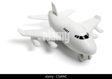 Jouet en plastique passenger jet avion sur fond blanc Banque D'Images